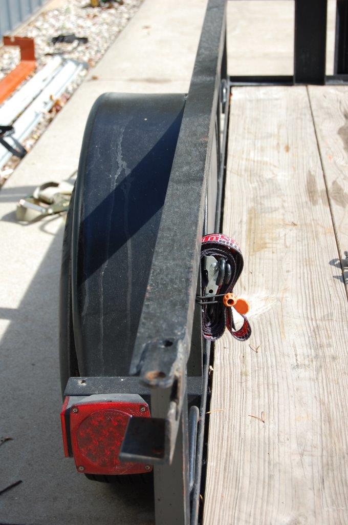 Trailer tie downs stowed