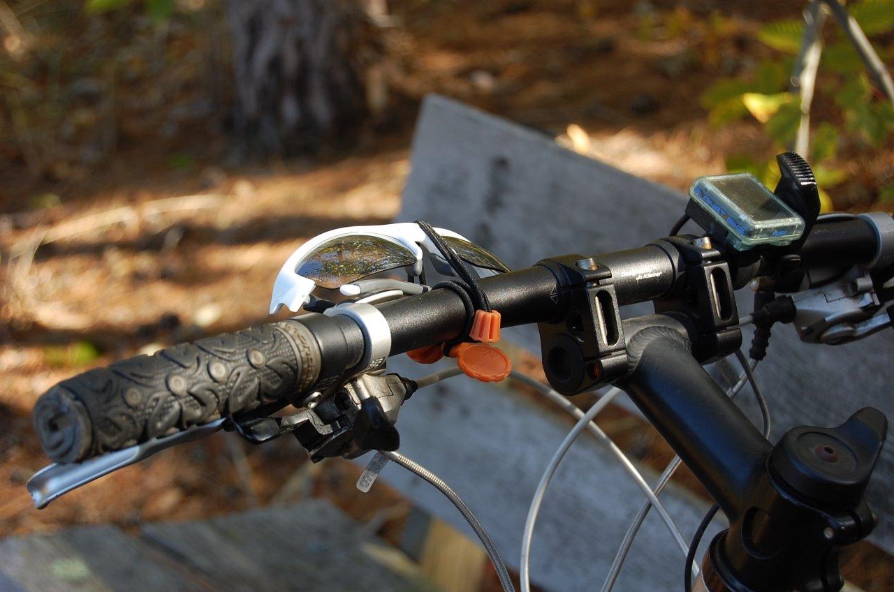 Sunglasses lashed to handlebar
